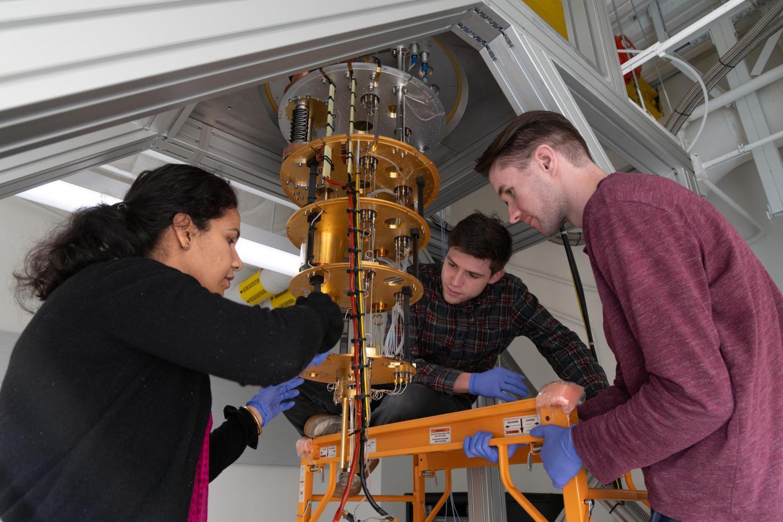 Students working with a Quantum dilution fridge