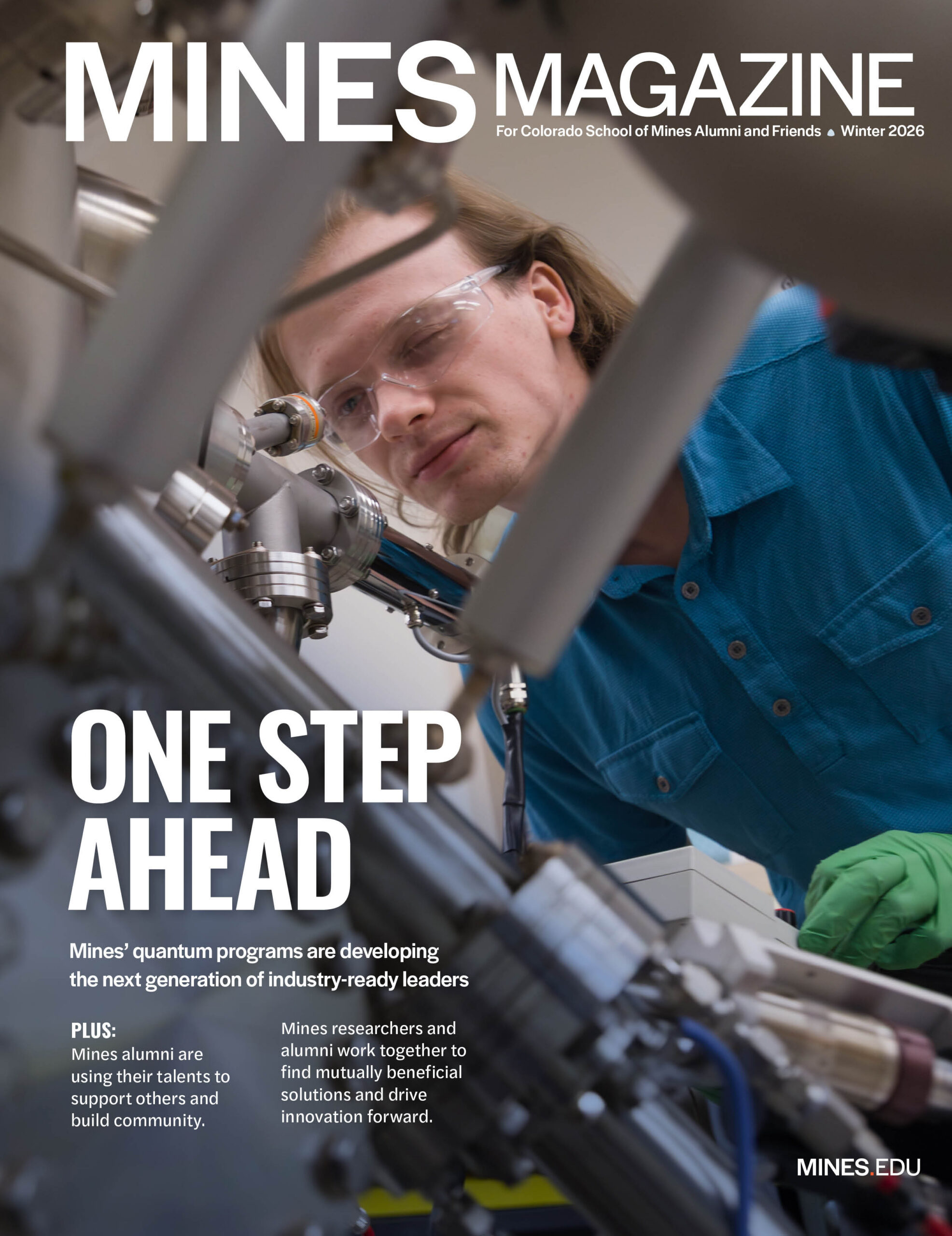 Cover of MINES Magazine Winter 2026 showing a researcher in safety glasses examining advanced quantum research equipment.